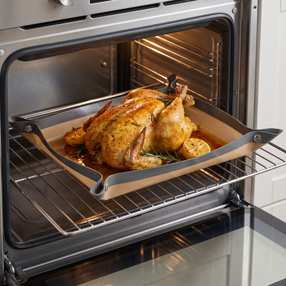 Roast chicken in the tray on the oven rack